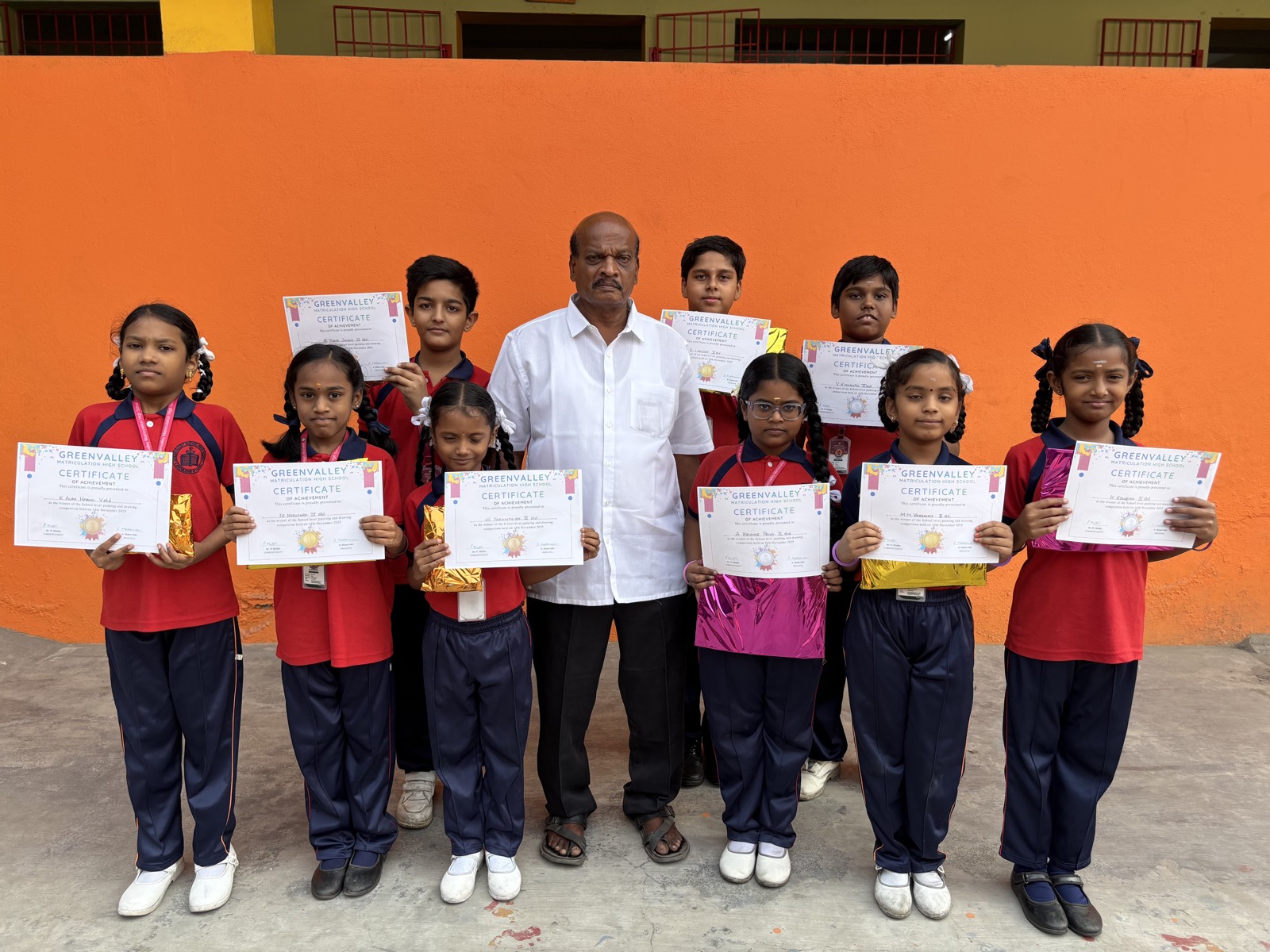 Students receiving recognition on stage